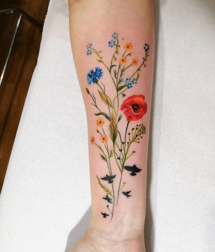 Colorful Wildflower Forearm Bouquet Tattoo Design