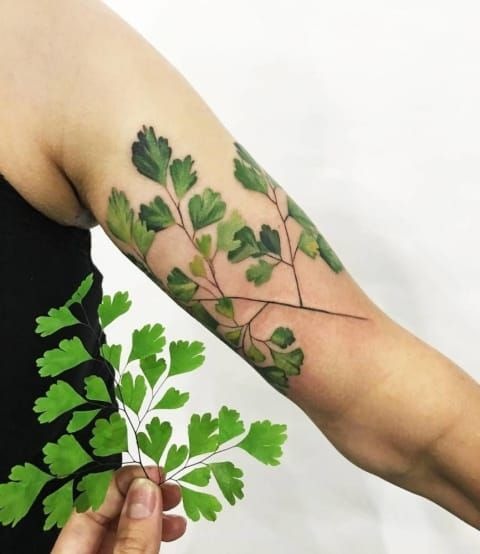 Fresh Green Botanical Arm Accent Tattoo Design