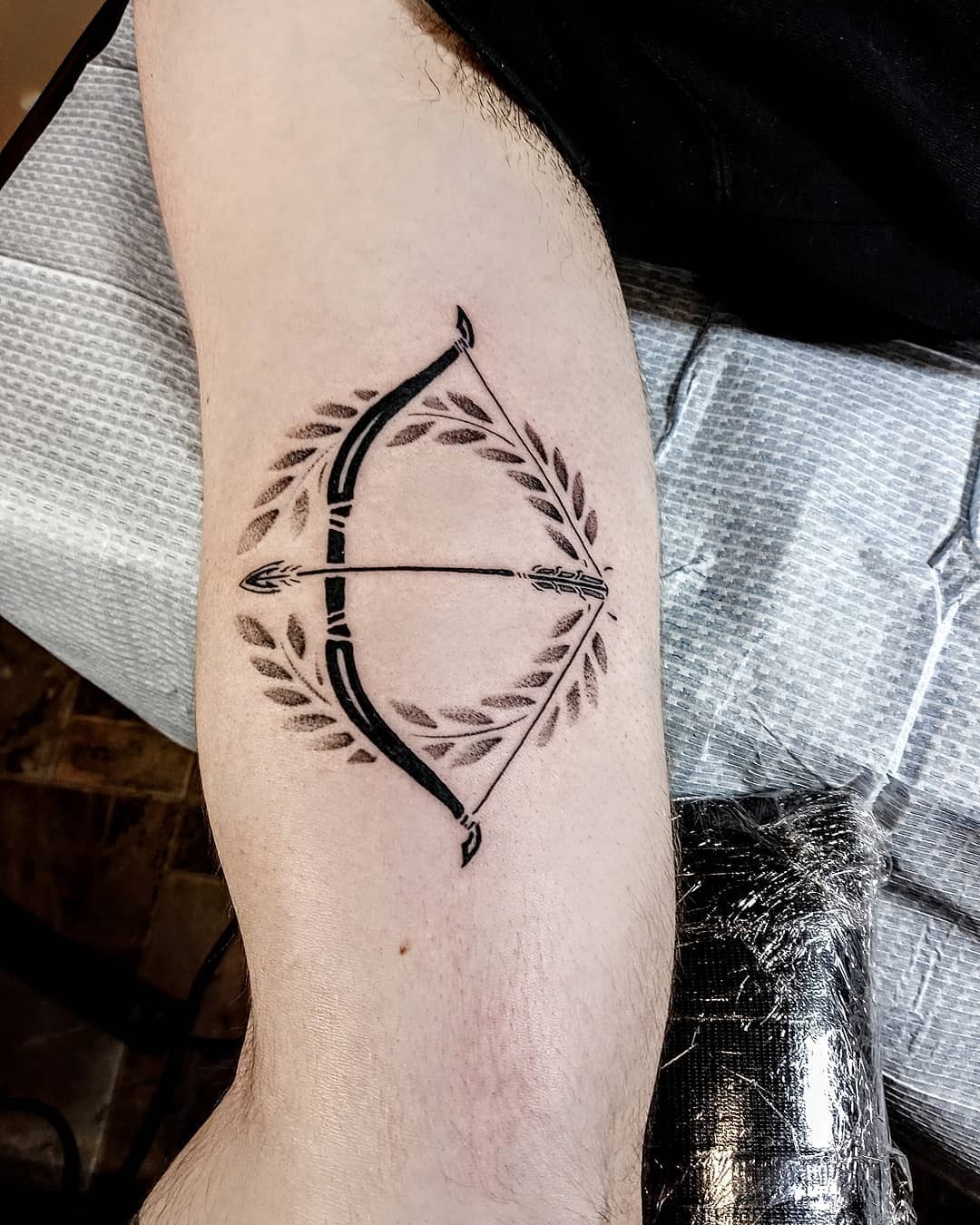 Greco Roman Style Tattoo Bow and Laurel Wreath Arrow Tattoo Tattoo Design