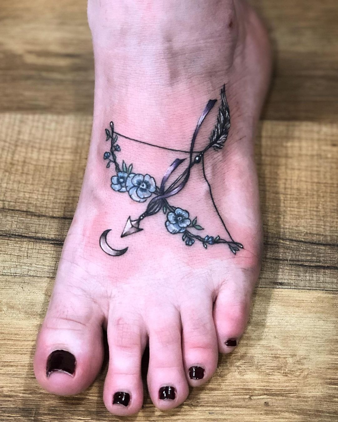 Lovely in Lilies Black Female Archer Tattoo Tattoo Design