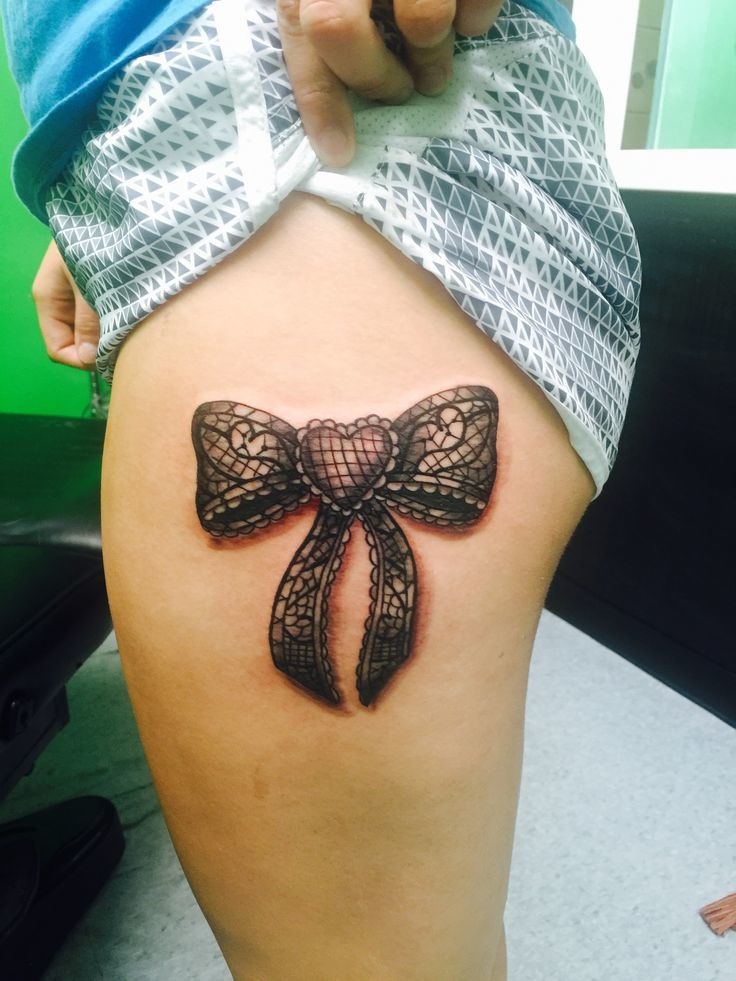 Heart-Centered Bow Design Tattoo Design