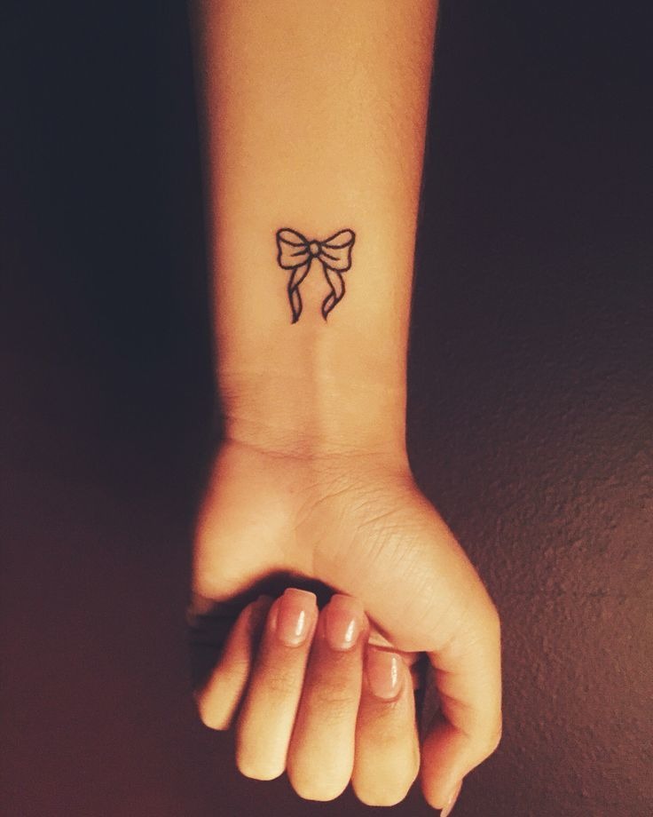 Simple tattoo of a bow Tattoo Design