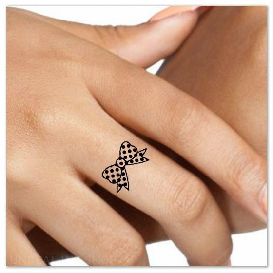 Simple Tiny Bow Design with Polka Dots Tattoo Design