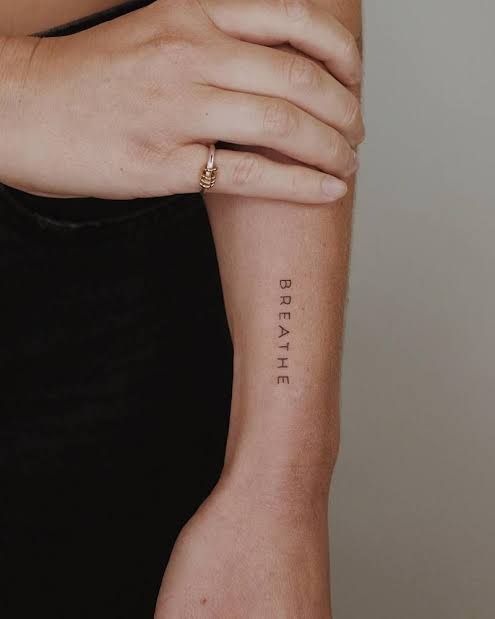 Flowing Breathe Script Tattoo Tattoo Design