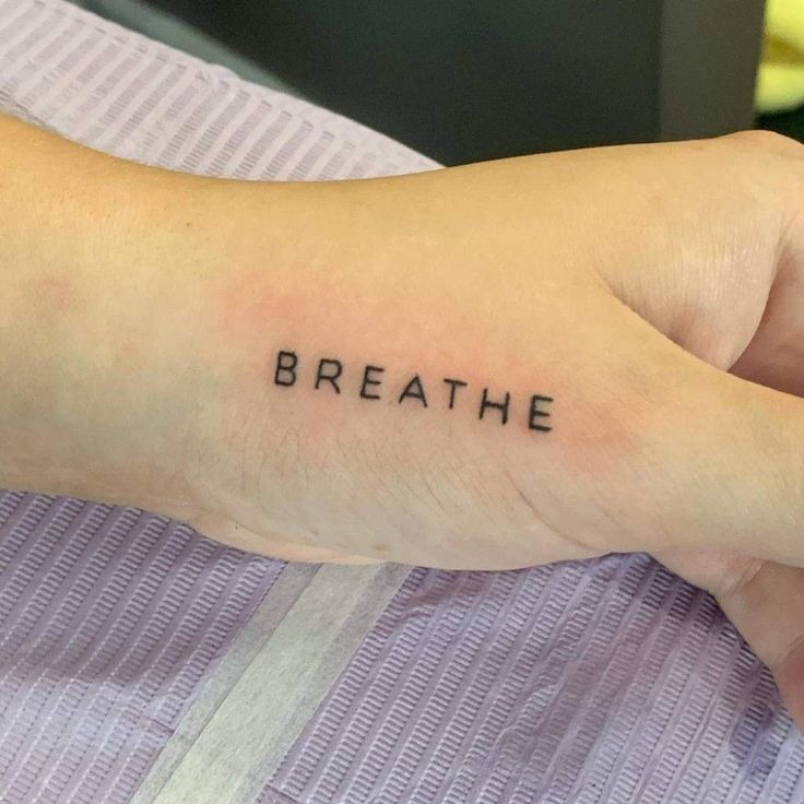 Om and Breathe Combined Symbol Tattoo Tattoo Design