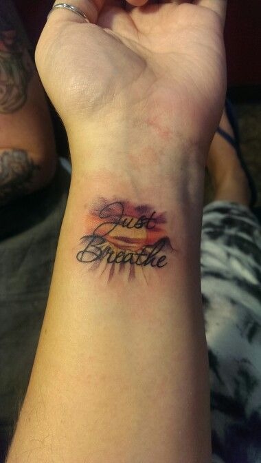 Ultra-Minimal Inner Arm BREATHE Tattoo Tattoo Design
