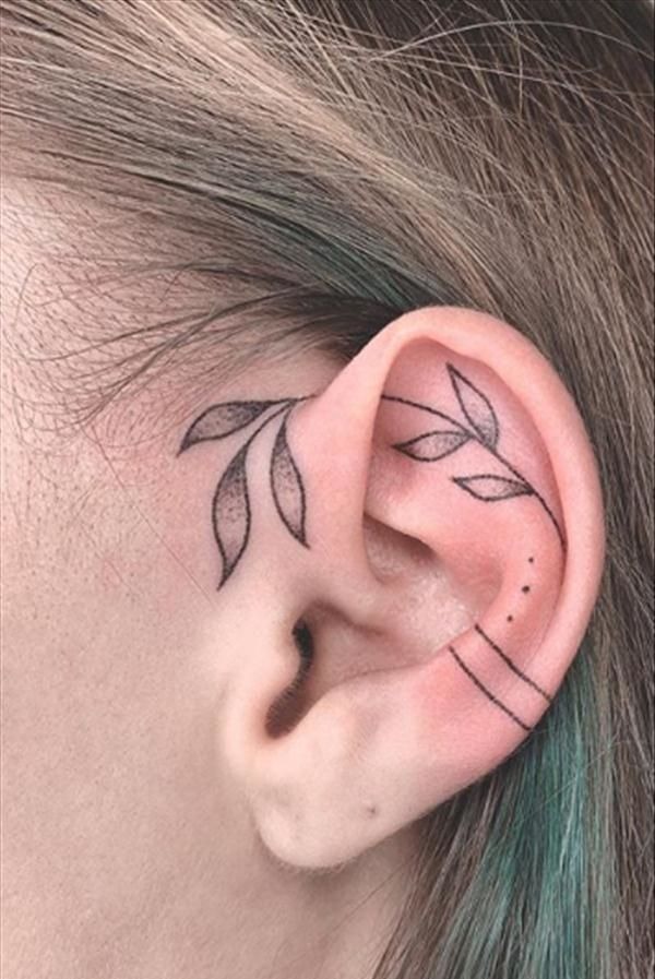 Subtle Saturn on Shoulder Tattoo Design