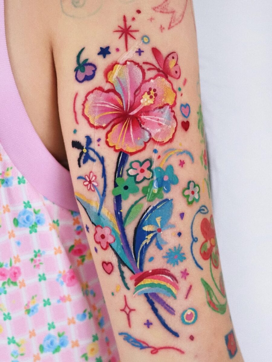 The design centers on colorful floral with playful imagery that reads clearly at a glance.