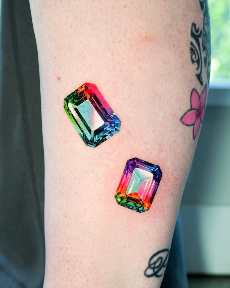 These bright gemstone tattoos reflect stunning color gradients.