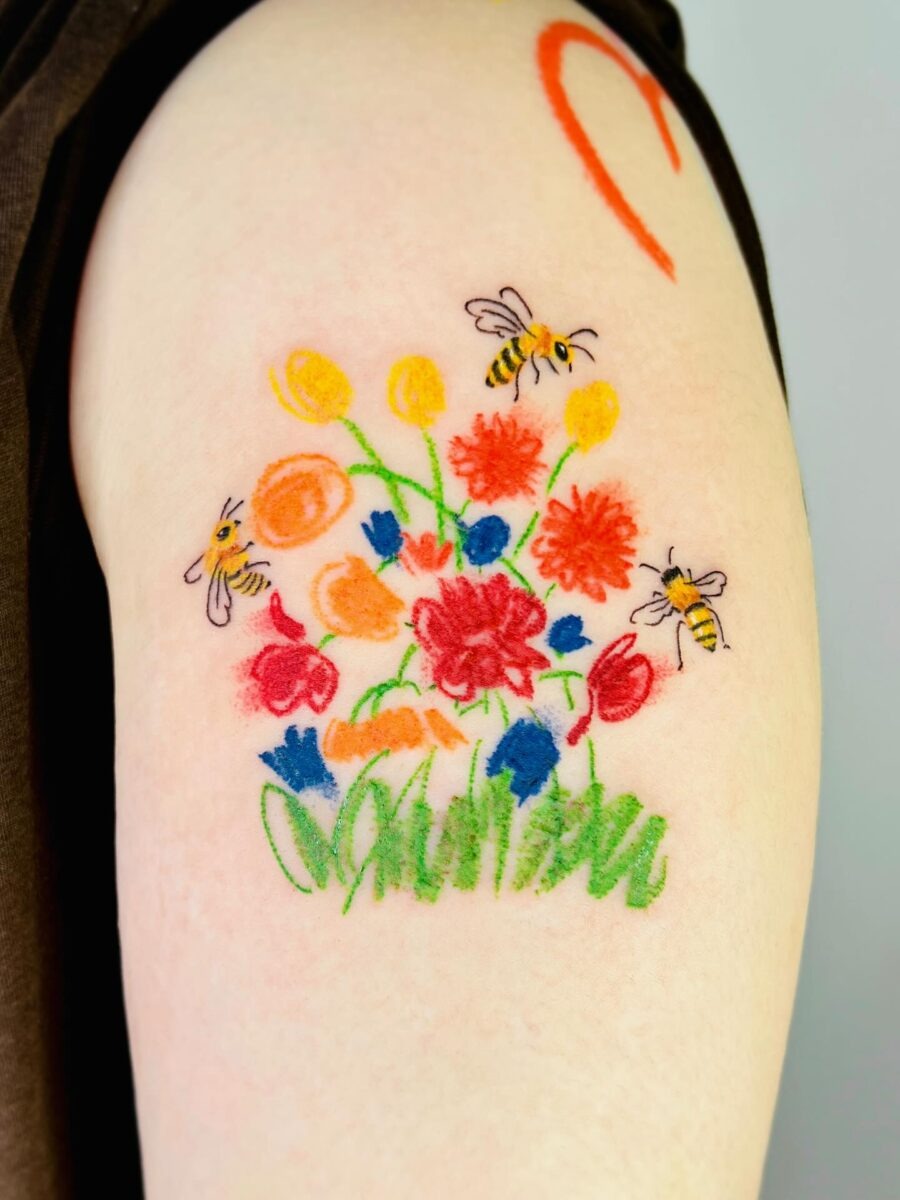 The design centers on floral with buzzing imagery that reads clearly at a glance.