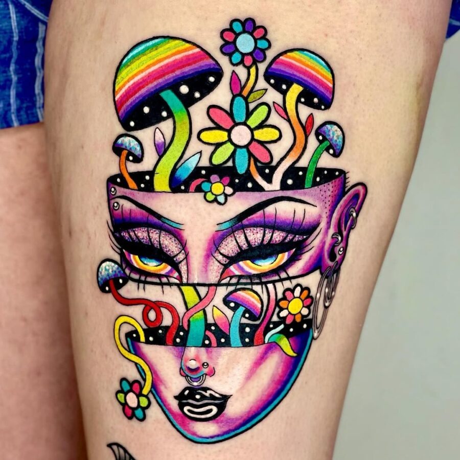 This tattoo features a striking blend of colors and designs.