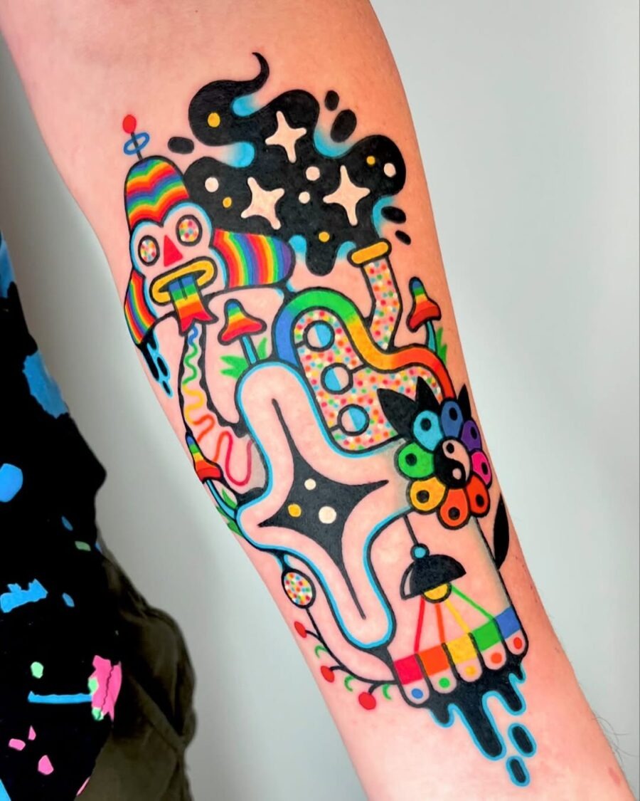 This tattoo showcases a lively mix of bright colors and whimsical shapes.