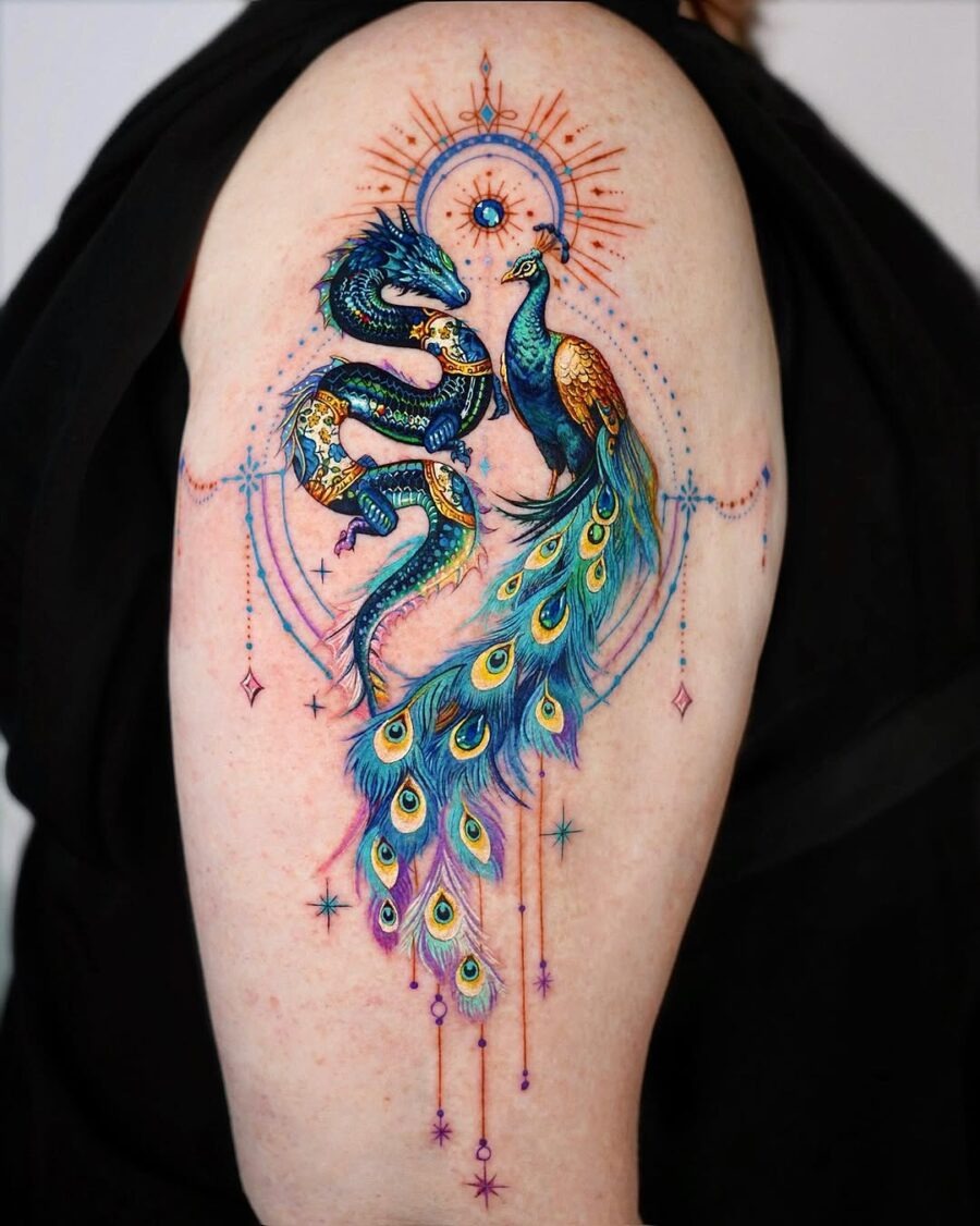 This stunning tattoo features a beautifully detailed peacock and a mystical dragon intertwined with colors.