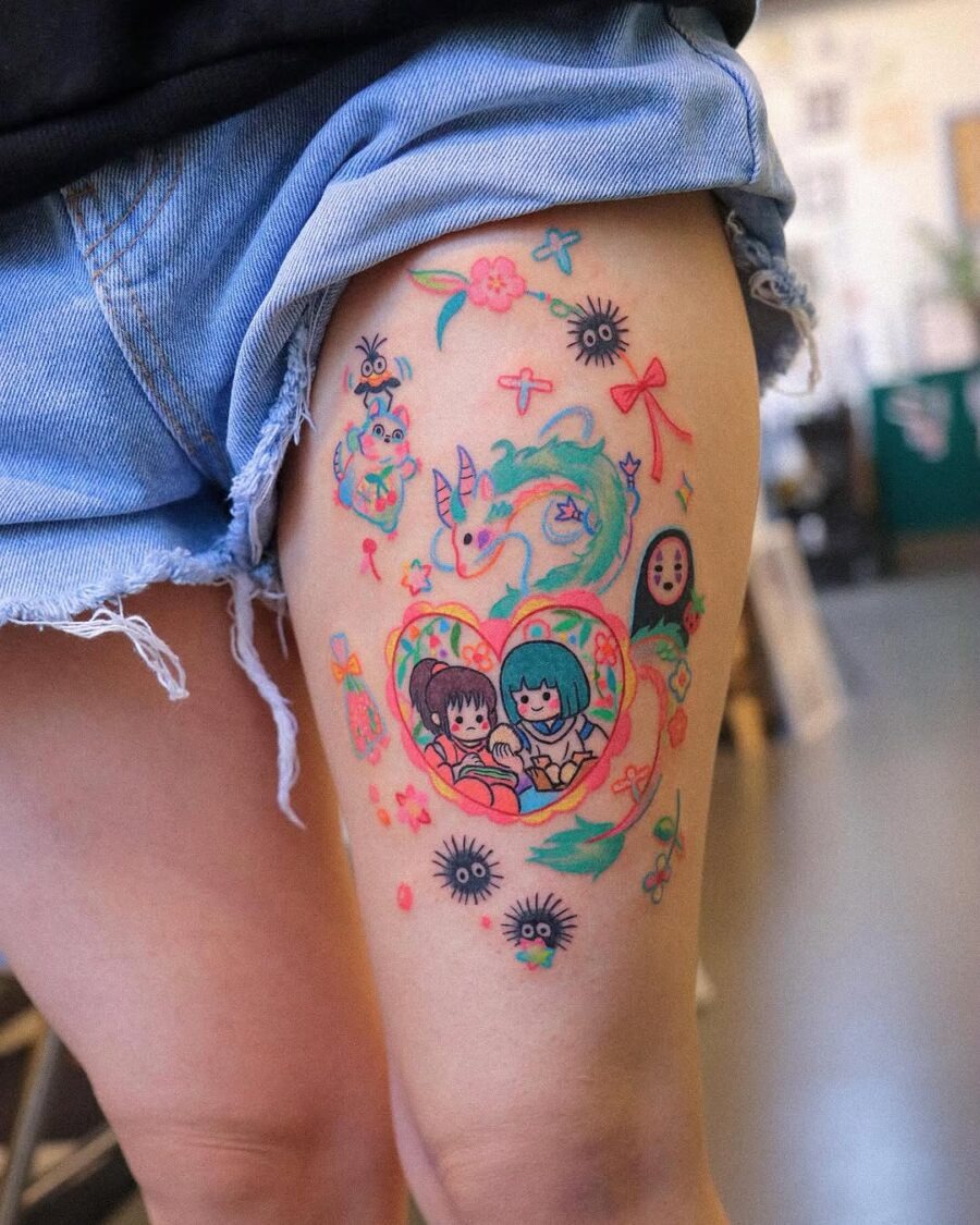 This thigh tattoo showcases a colorful design filled with playful characters and elements.