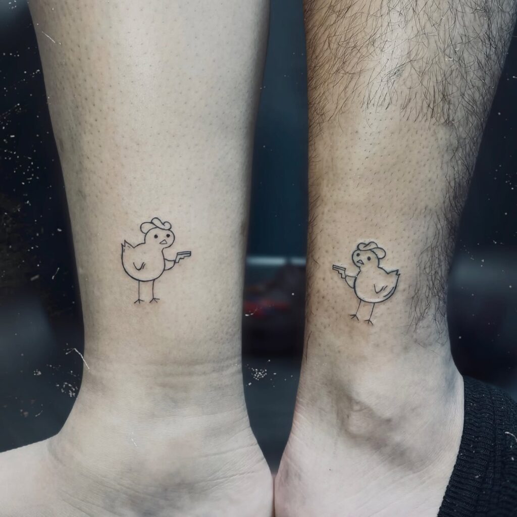 Tom and Jerry Shooting Hearts Tattoo Tattoo Design