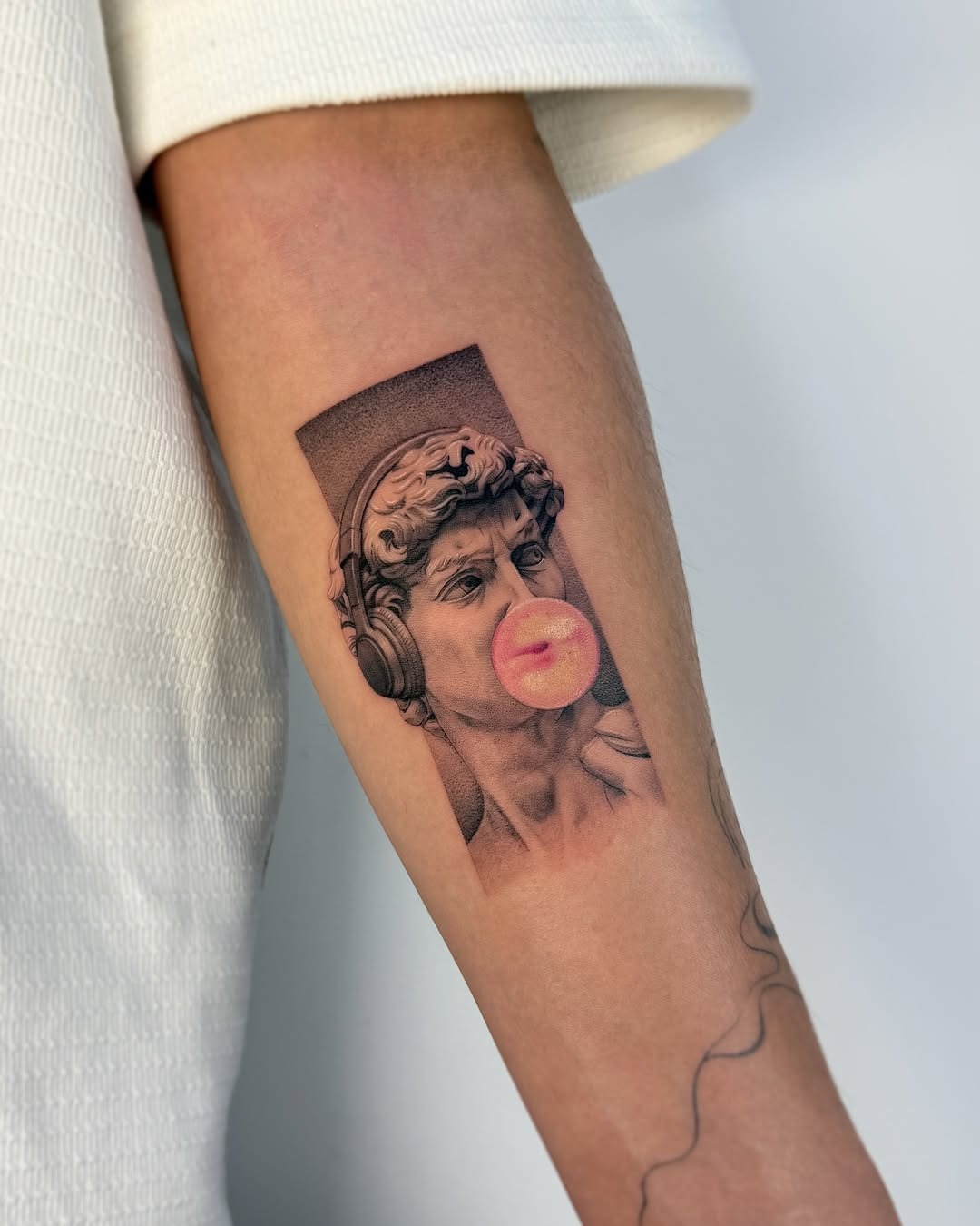 Whimsical take on classic sculpture with bubble gum Tattoo Design