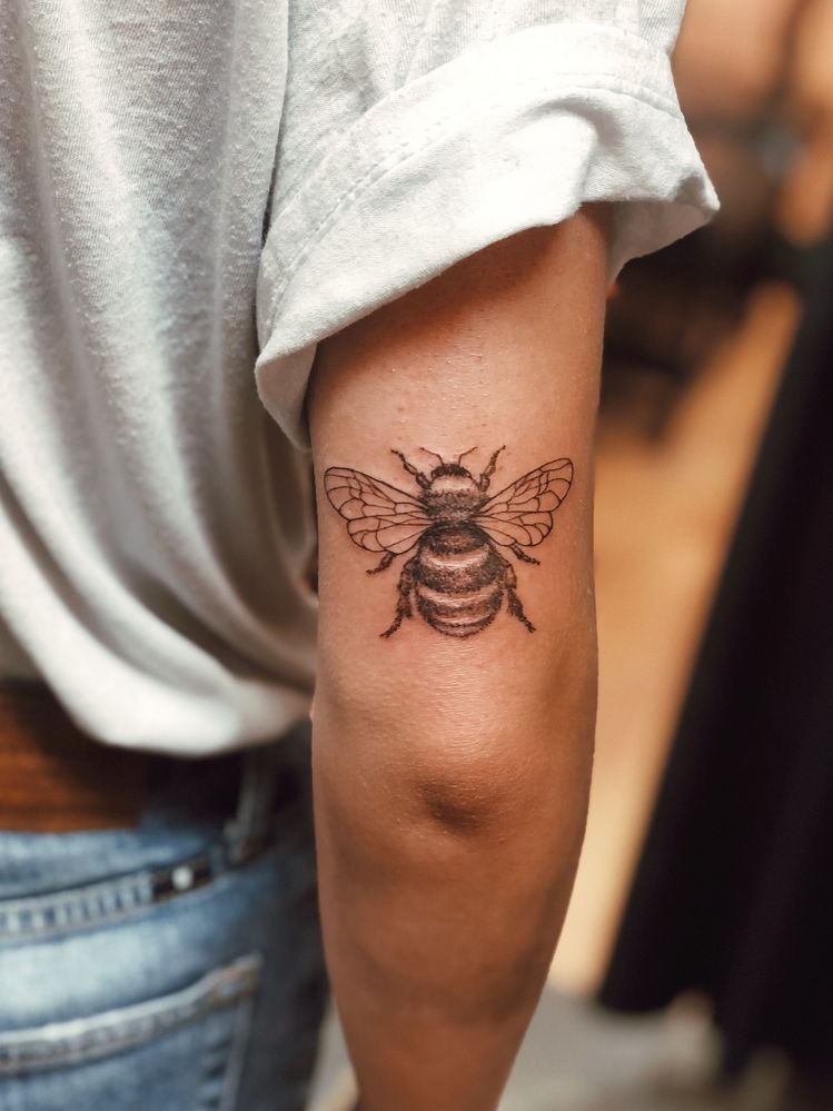 Classic Realistic Bee at the Elbow Tattoo Design