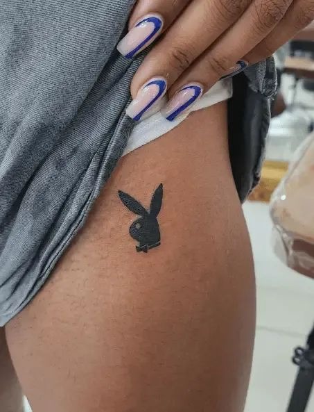 Balloon-Leaping Bunny Tattoo Design