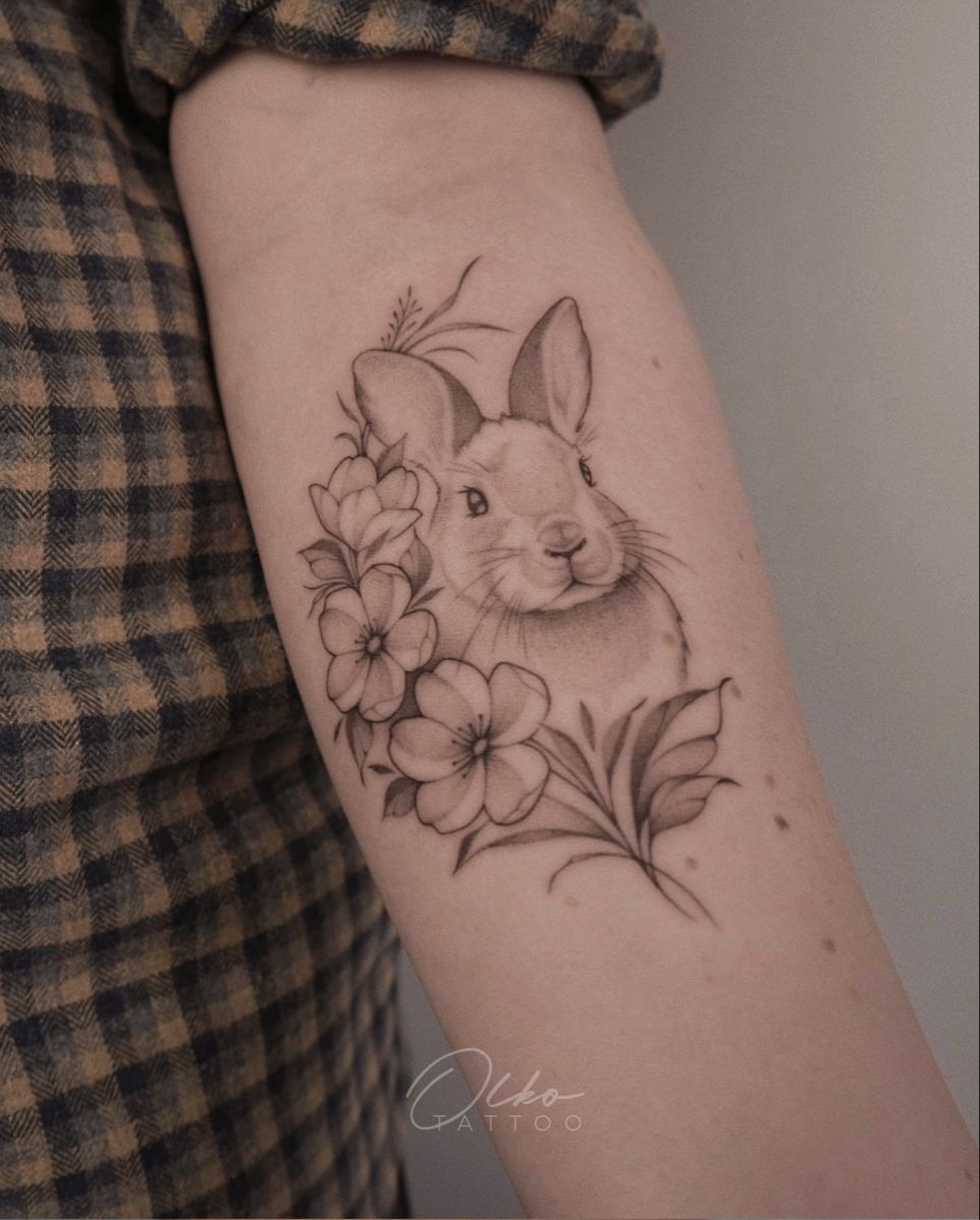 Floral Sleeve Bunny Tattoo Design
