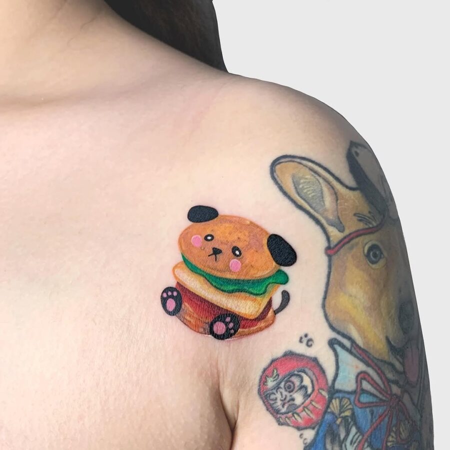 Adorable burger tattoo with puppy features Tattoo Design