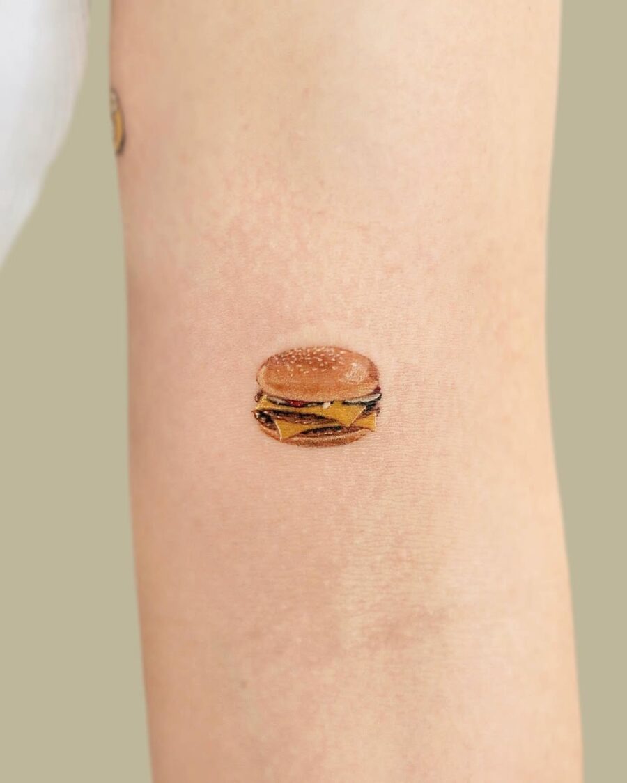 Deliciously detailed burger tattoo on forearm Tattoo Design