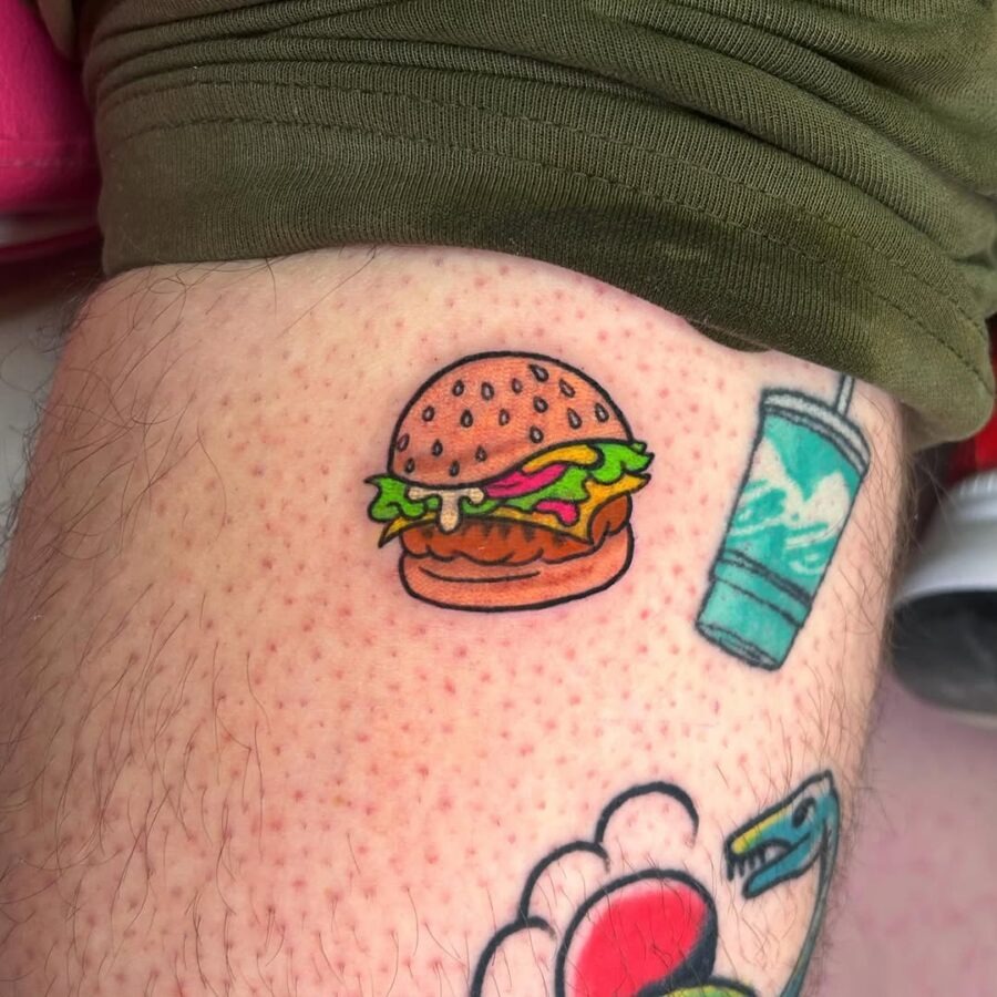 Playful burger tattoo brings joy to ink. Tattoo Design