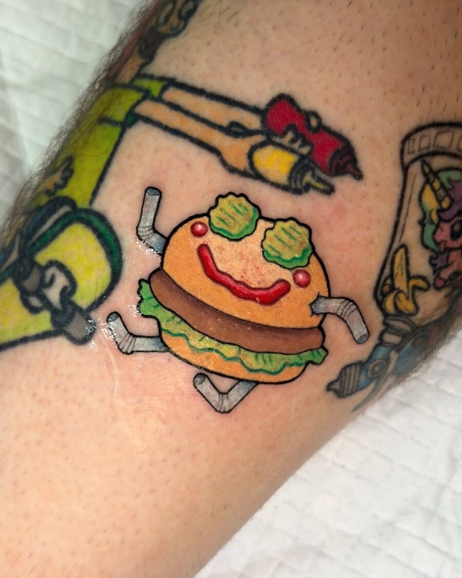 Playful burger tattoo with a cheerful vibe Tattoo Design