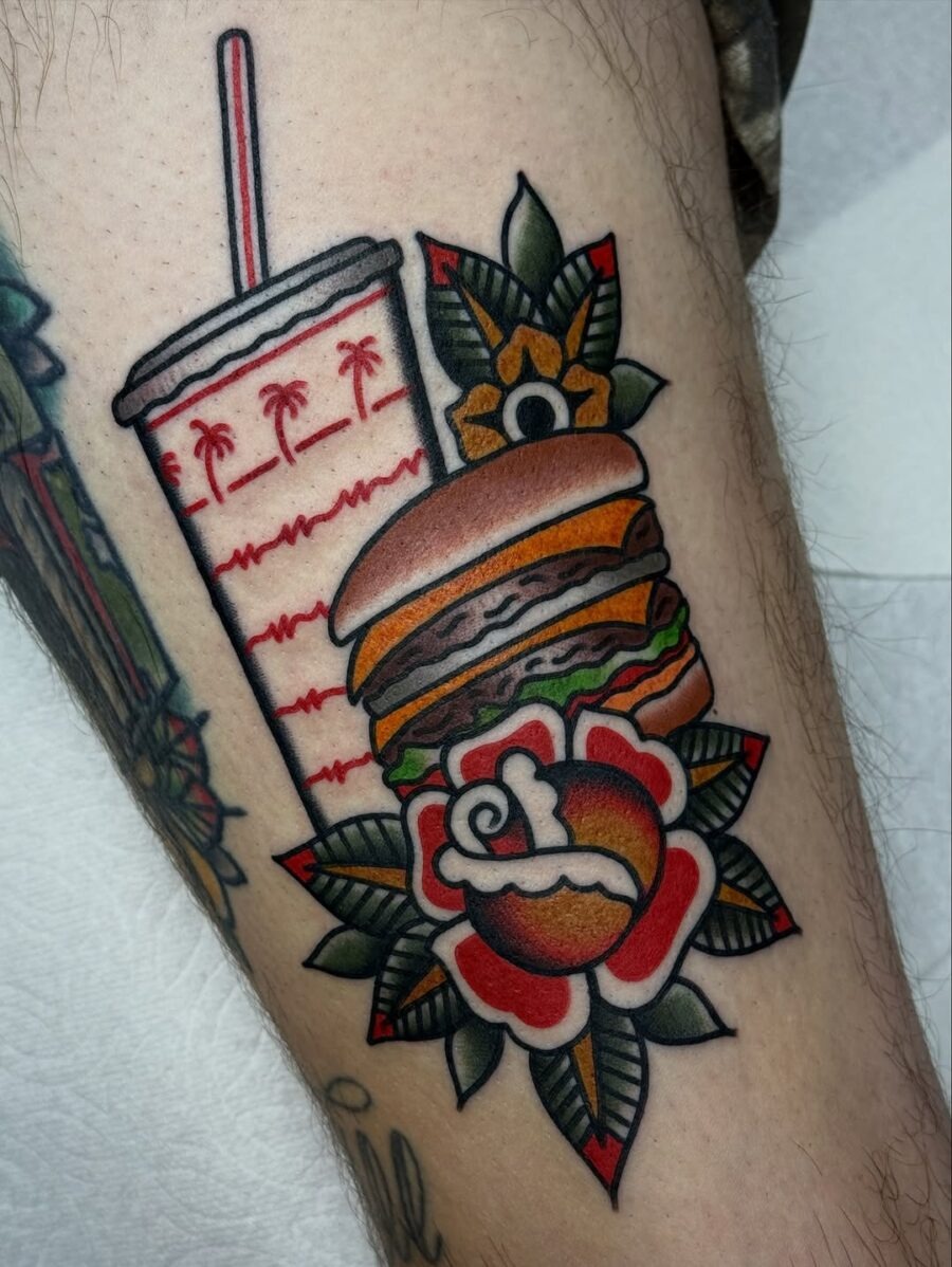 Playful burger tattoo with vibrant layers Tattoo Design