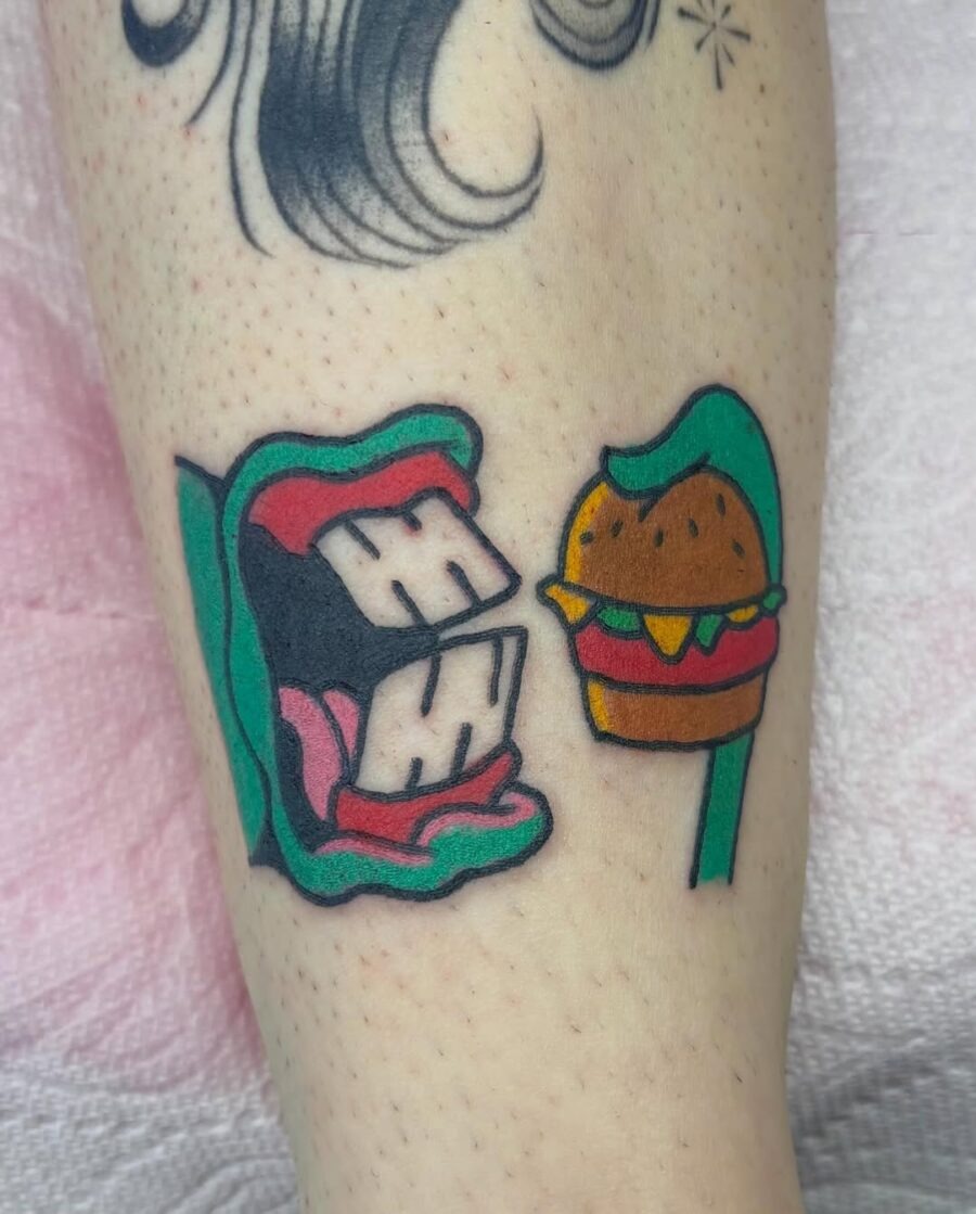 Playful mouth and burger tattoo design Tattoo Design