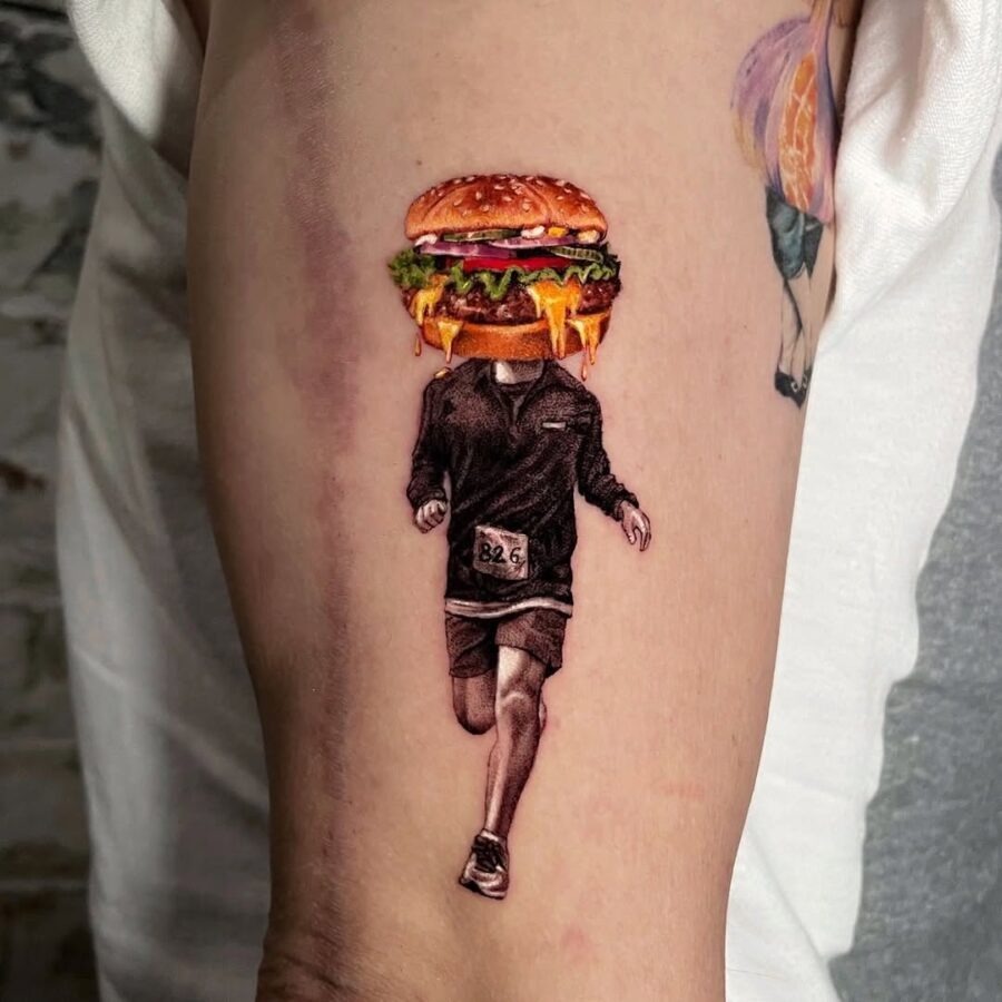 Unique burger-themed runner tattoo Piece Tattoo Design