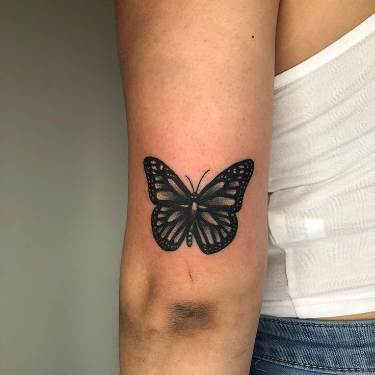 Delicate Butterfly and Swirl Tattoo on the Forearm Tattoo Design