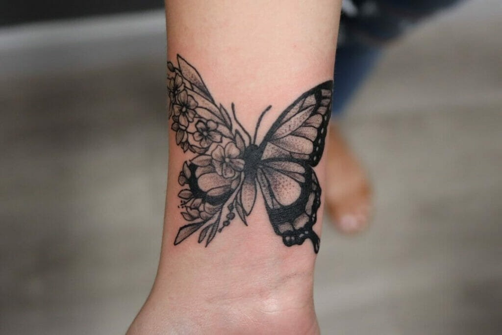 Delicate Floral and Butterfly Design on the Wrist Tattoo Design