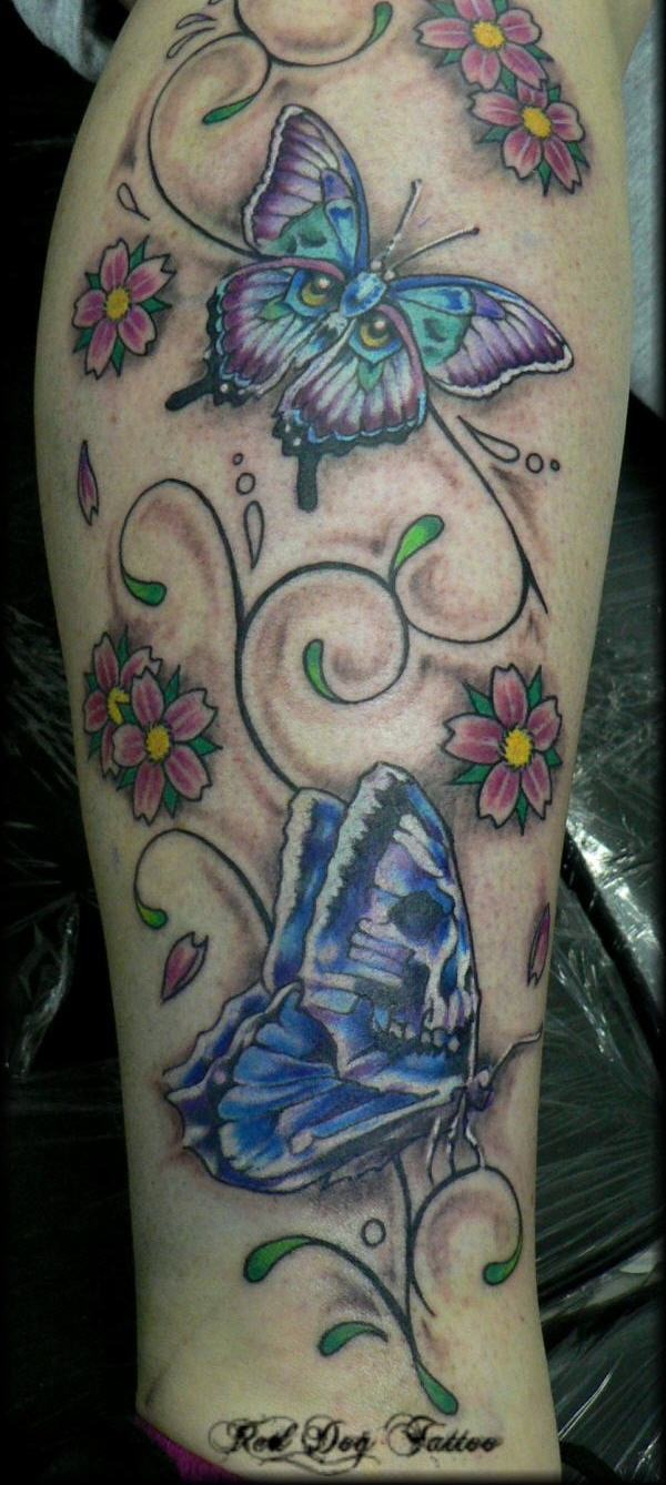 Cool butterfly on a girl's chest tattoo, intricate design.