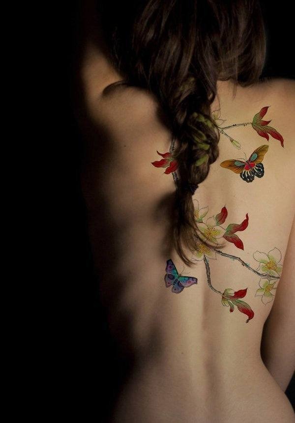 A leg butterfly tattoo, detailed design.
