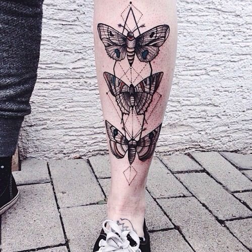 Epic butterfly on a girl's back tattoo, detailed design on the back.