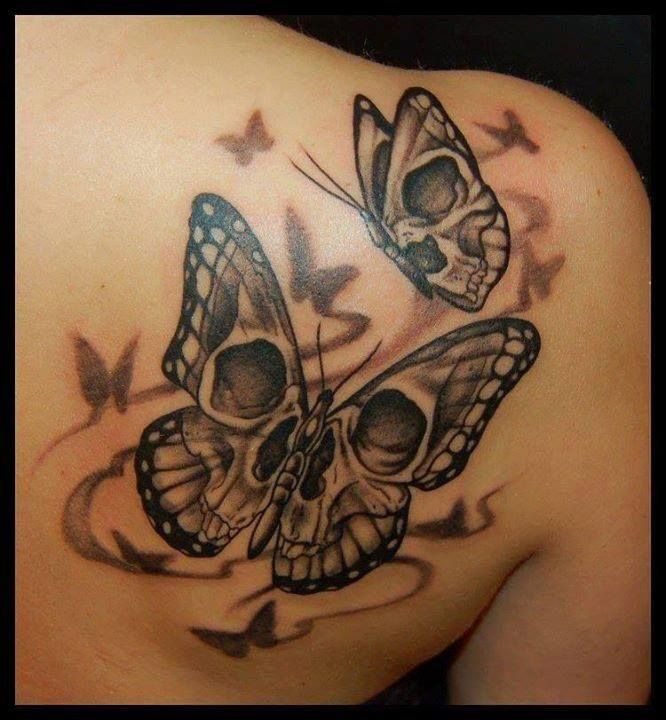 Hollow Skull-Winged Butterflies tattoo, detailed design on the shoulder.