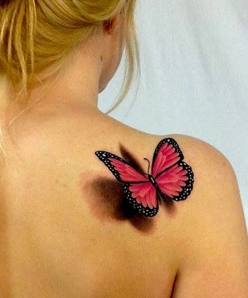 Cool butterfly on a girl's back tattoo, detailed design on the shoulder.