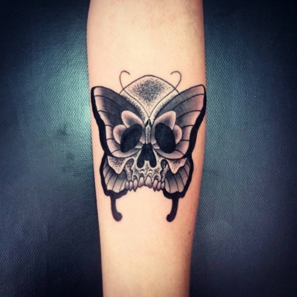 Butterfly Skull Forearm tattoo, detailed design on the forearm.