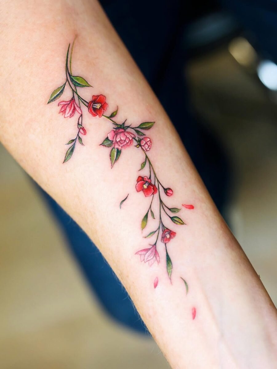 Delicate Camellia Tattoo on Forearm Tattoo Design