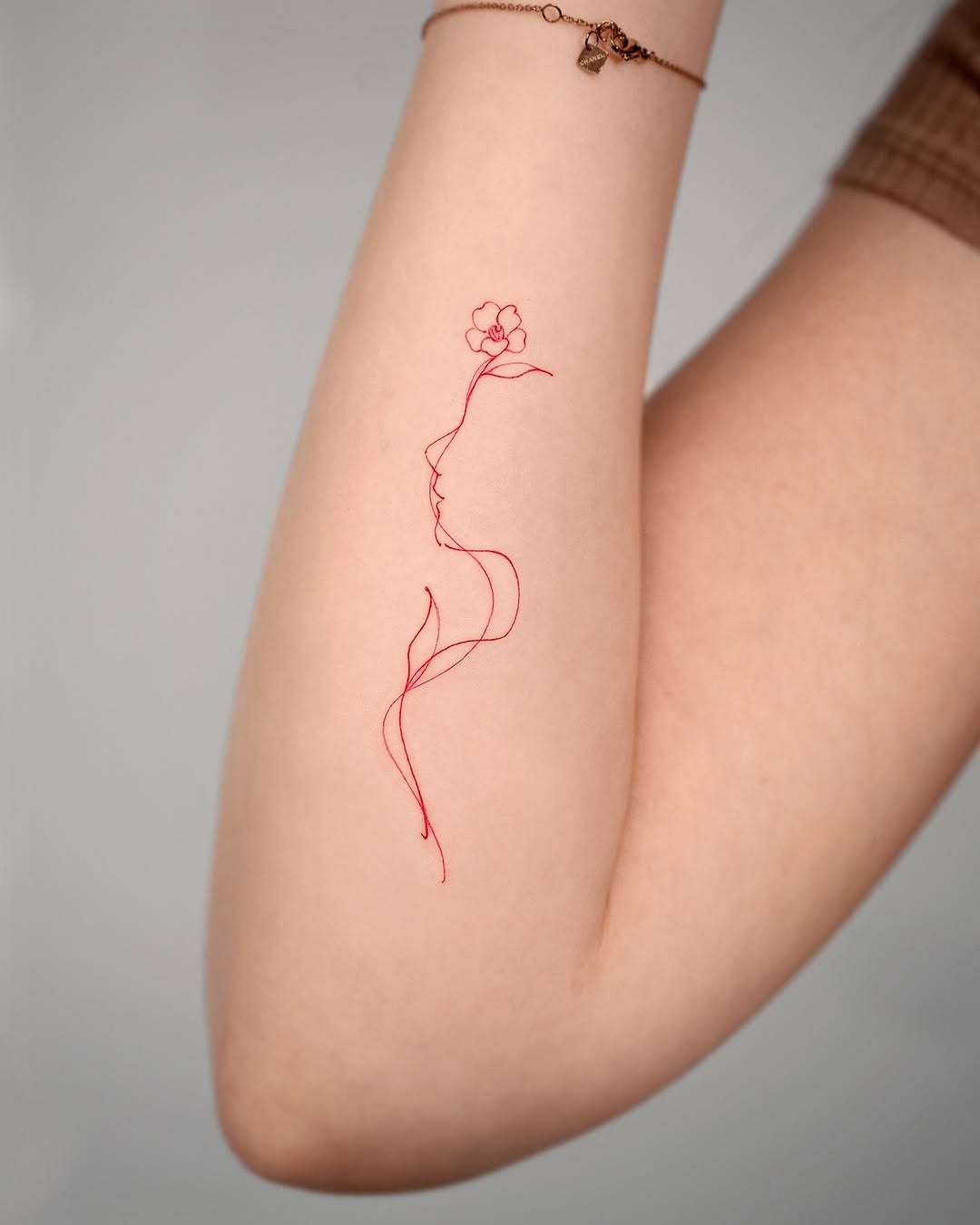 Elegant camellia tattoo on a graceful silhouette Tattoo Design