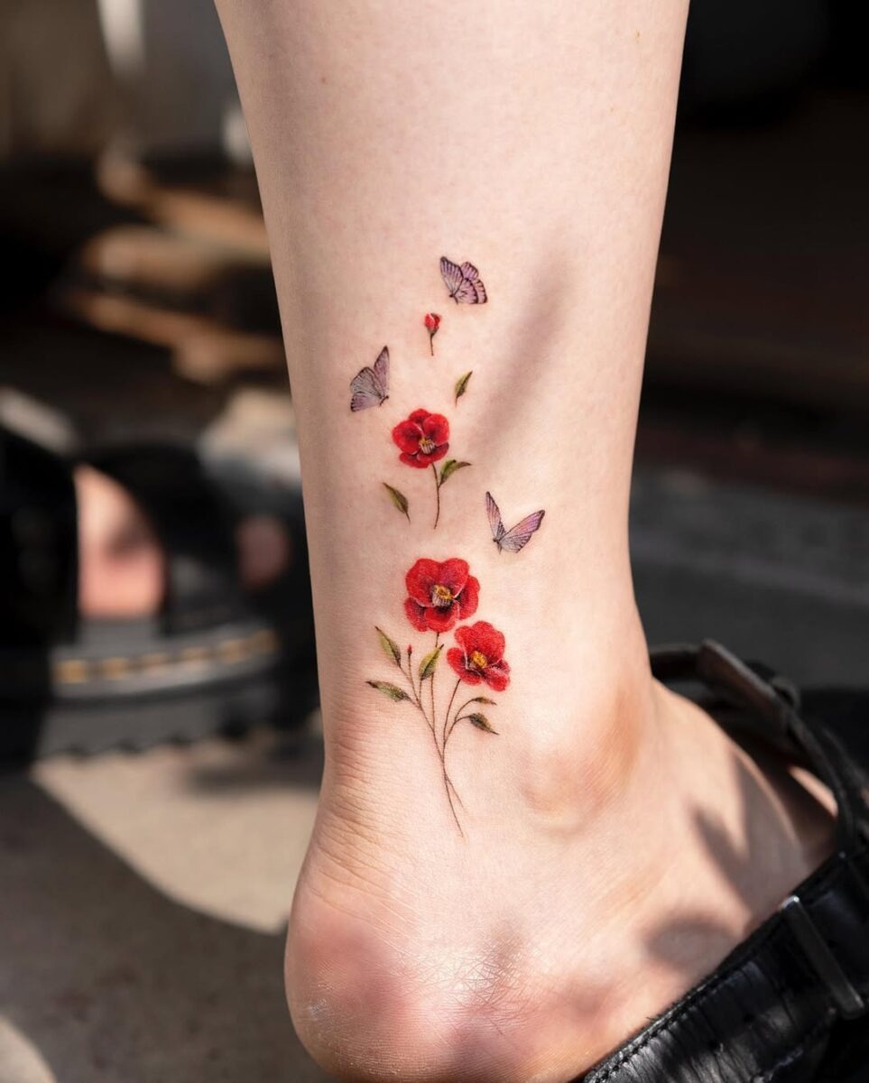 Enchanting camellia tattoo with delicate butterflies Tattoo Design