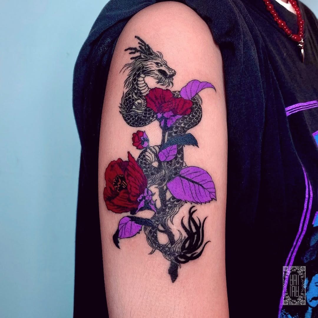 Striking dragon entwined with vibrant camellias Tattoo Design