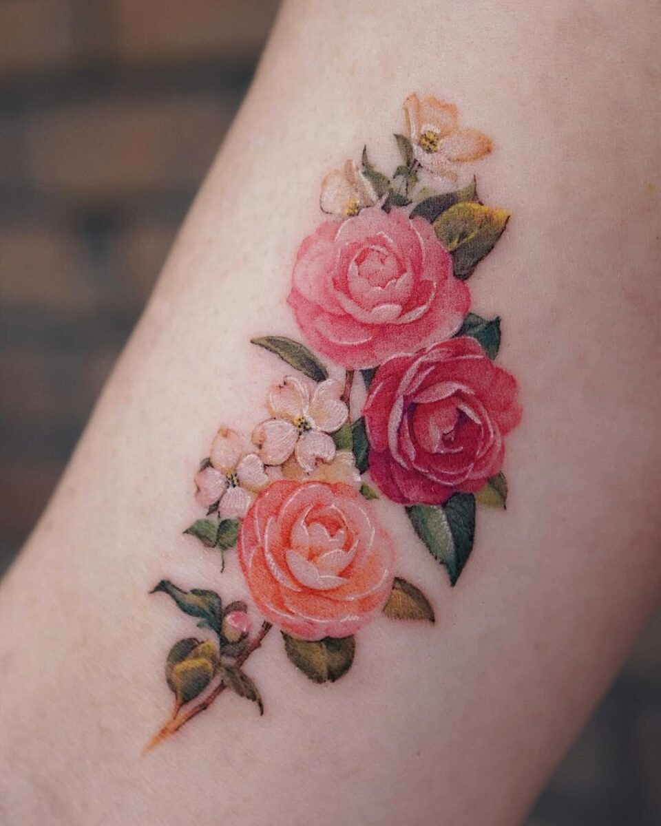 Stunning Camellia Tattoo in Vibrant Colors Tattoo Design