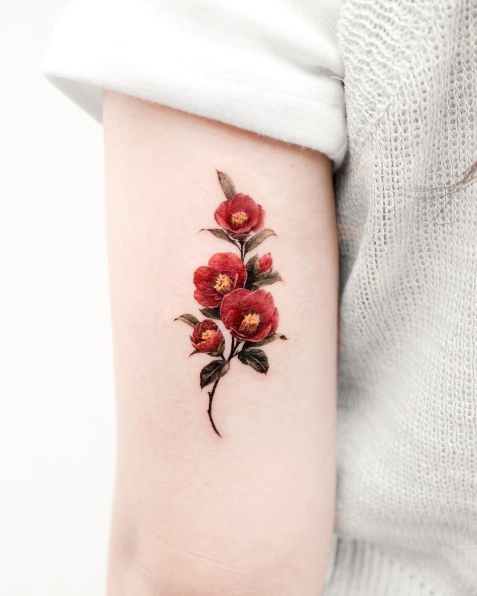 Stunning Camellia Tattoo on Arm Tattoo Design
