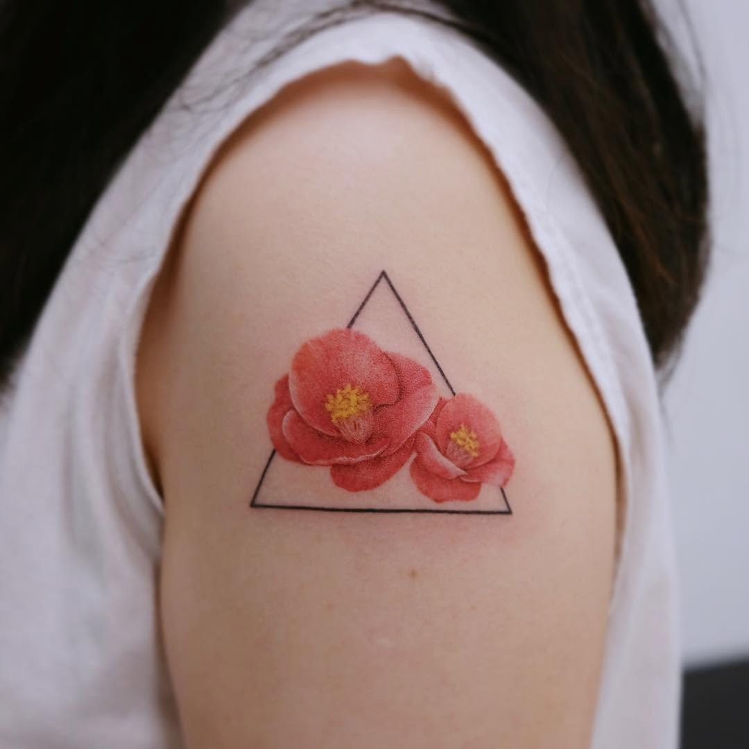 Stunning camellia tattoo with geometric touch Tattoo Design