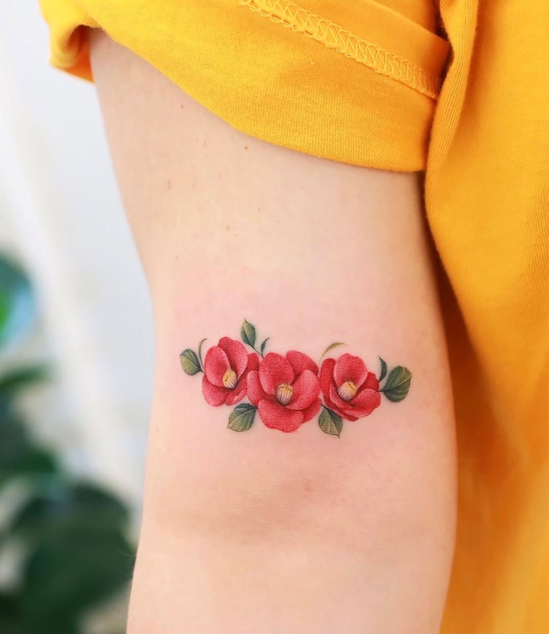 Vibrant Camellia Tattoo: A Colorful Floral Design Tattoo Design