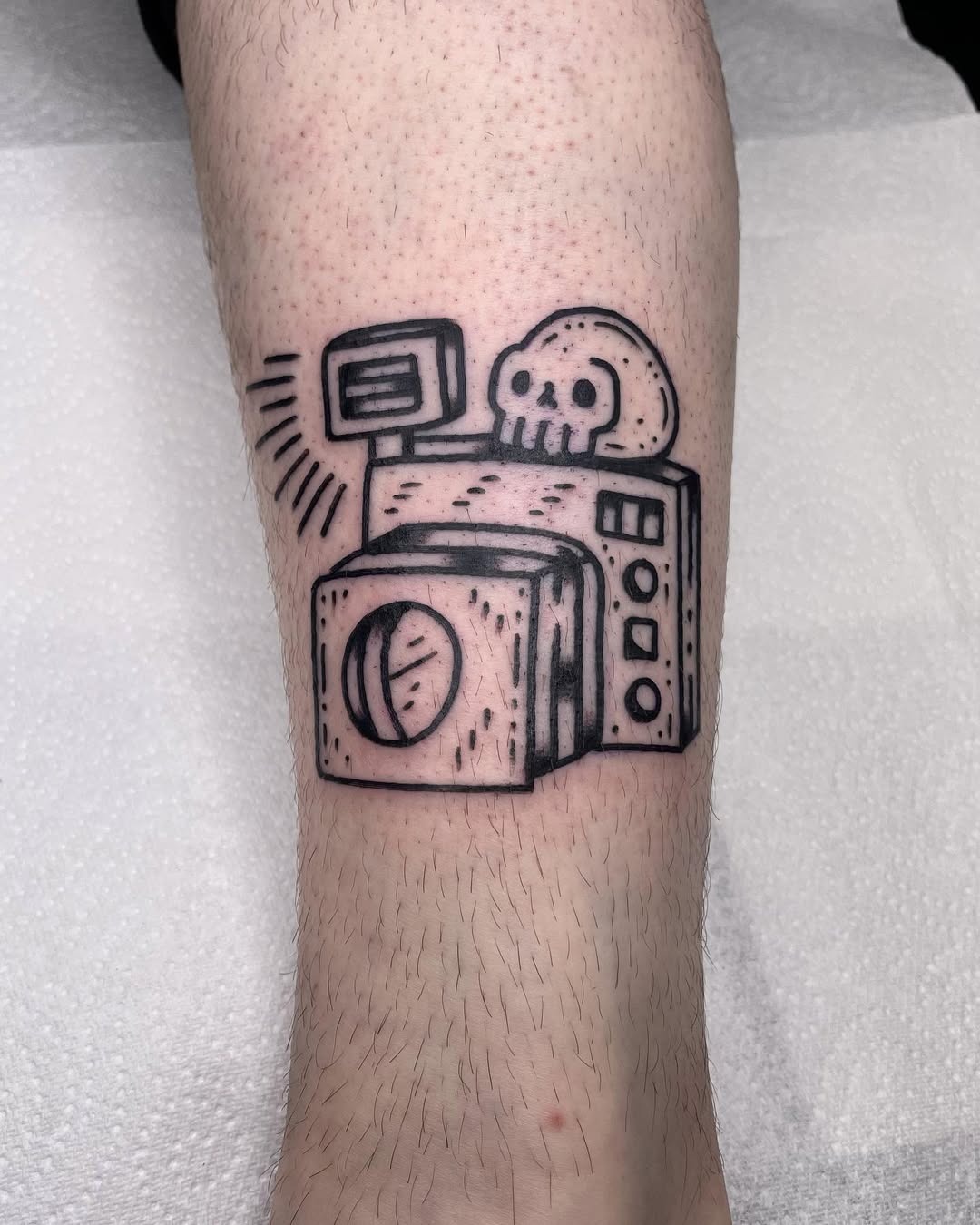 Playful skull camera tattoo design for photo lovers Tattoo Design