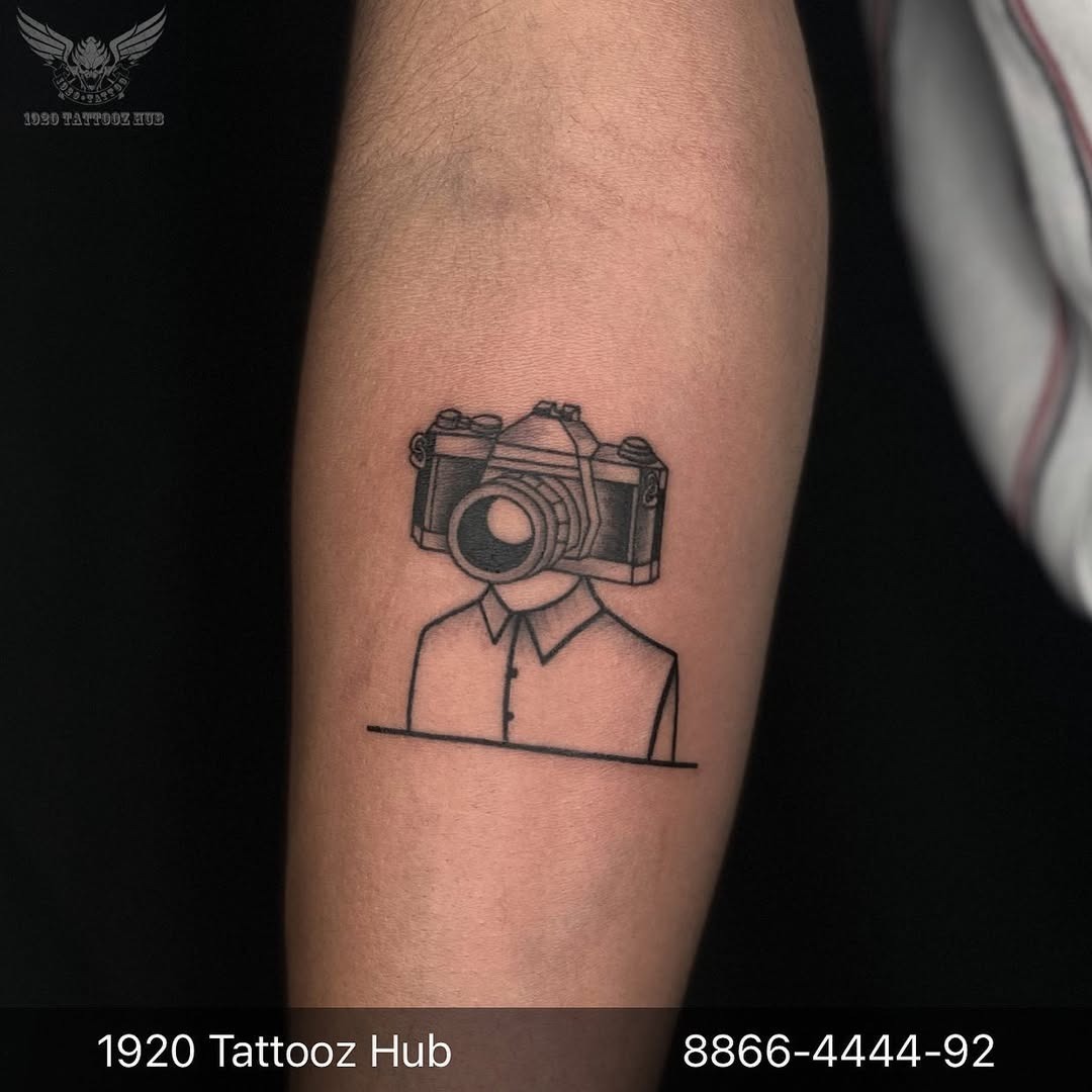 Stylish camera tattoo with a unique twist Tattoo Design