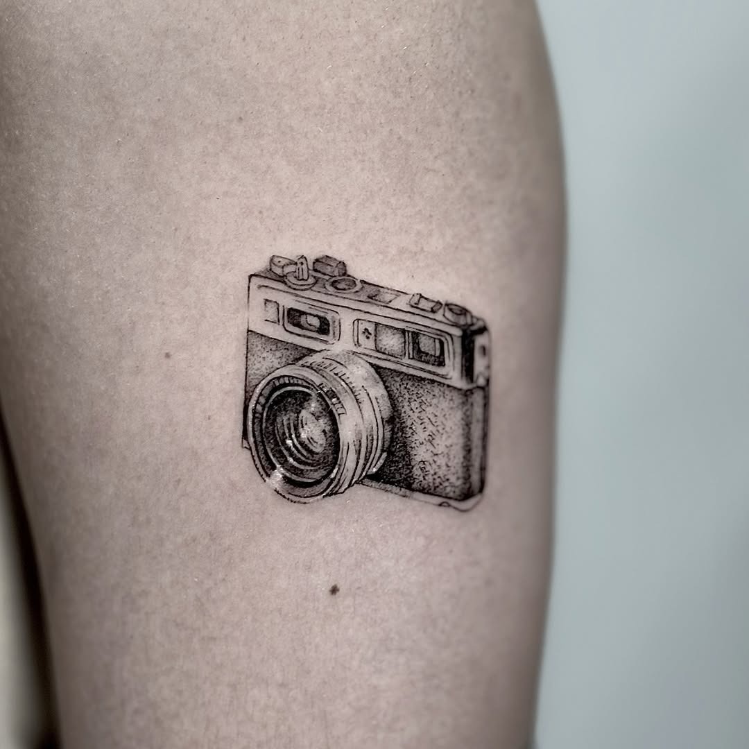 Stylish vintage camera tattoo for photography lovers Tattoo Design