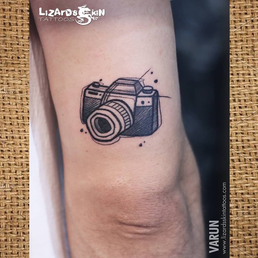Unique camera tattoo design with artistic flair Tattoo Design